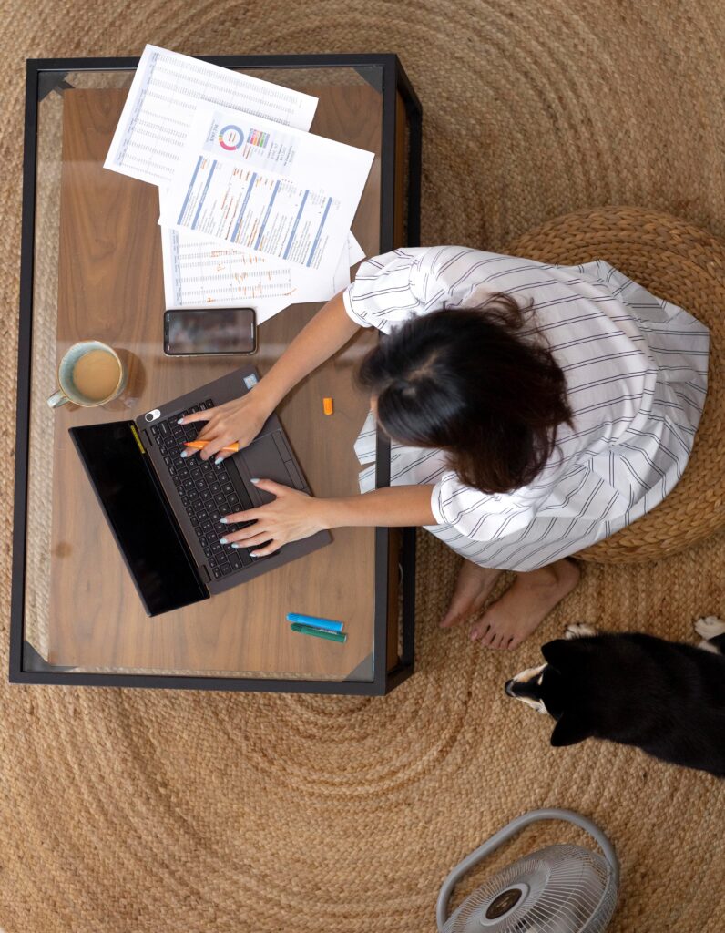 full shot woman working remotely